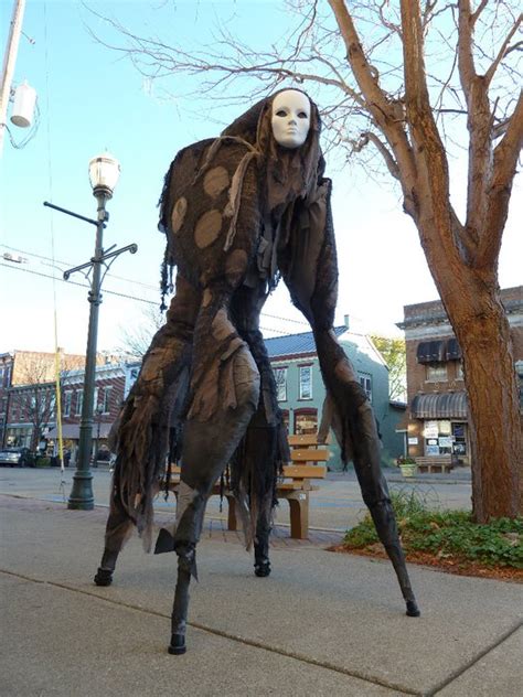 costumes for stilt walkers|four legged stilt spirit costume.